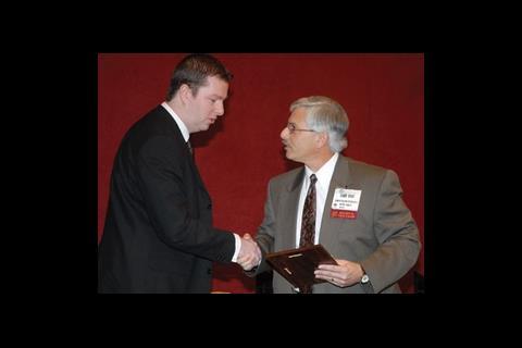 Michael Norton receives his award from ASHRAE regional vice-chair Larry Stoff